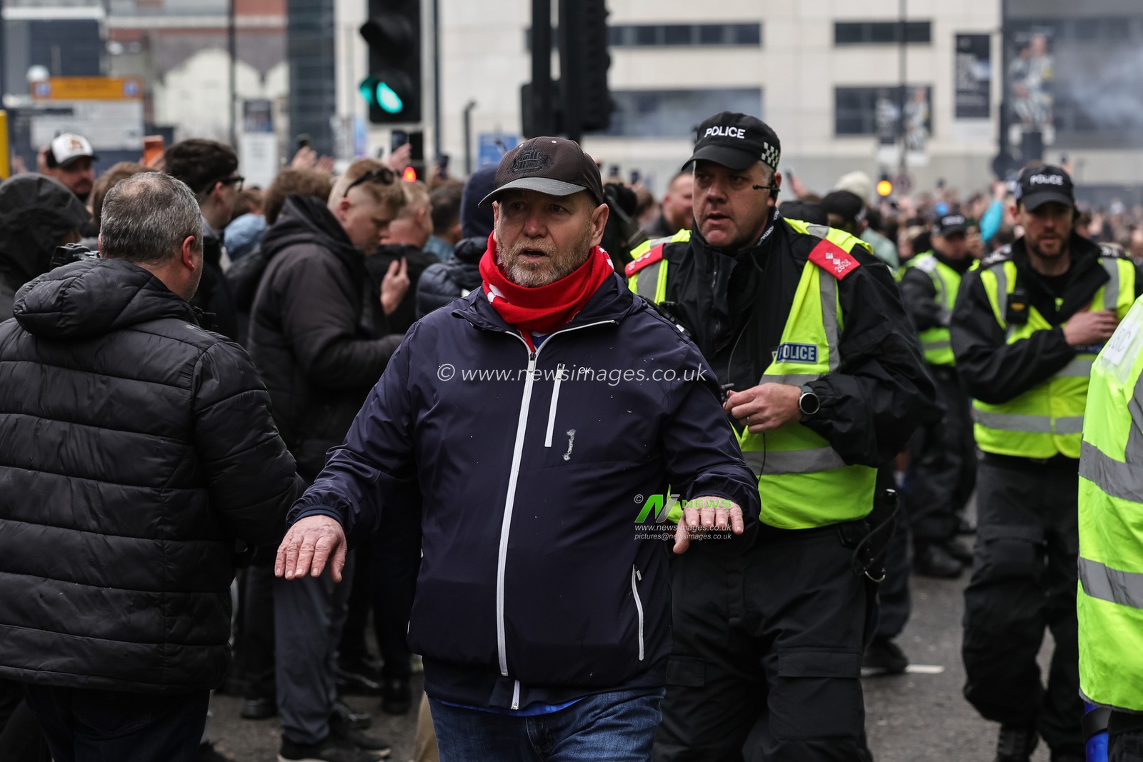Police guide Sunderland fans through the Newcastle fans during the Premier League match Newcastle Untied vs Sunderland at St. James's Park, Newcastle, United Kingdom on 22 March 2026

(Photo by News Images)