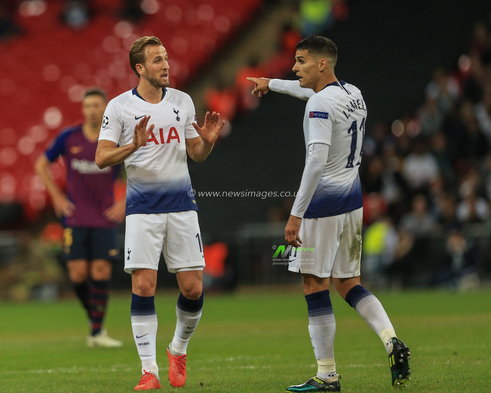 3rd October 2018, Wembley Stadium, London, England; UEFA Champions League, Tottenham v Barcelona ; Harry Kane (10) of Tottenham tells Erik Lamela (11) of Tottenham  to calm down

Credit: Mark Cosgrove/News Images