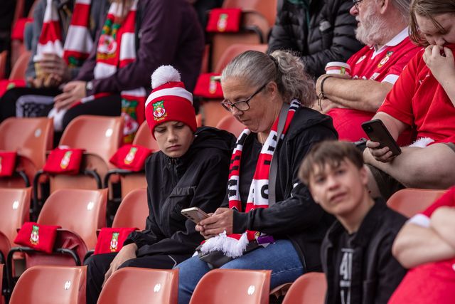 Fans during the Sky Bet League 1 match Wrexham vs Stockport County at SToK Cae Ras, Wrexham, United Kingdom, 22nd March 2025

(Photo by Nik Mesney/News Images)