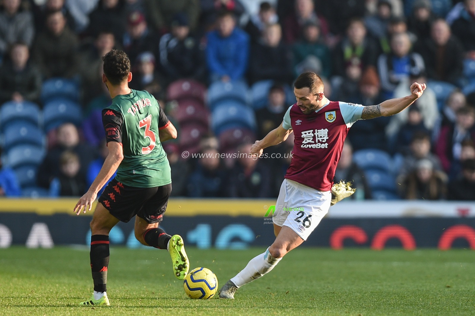 1st January 2020, Turf Moor, Burnley, England; Premier League, Burnley v Aston Villa : Phillip Bardsley (26) of Burnley ahead of Neil Taylor (3) of Aston Villa 

Credit: Richard Long/News Images