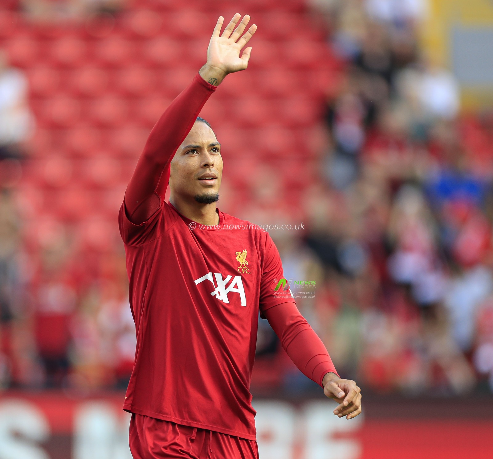 23rd August 2019 , Anfield, Liverpool, England; Premier League Football, Liverpool vs Arsenal ;  Virgil van Dijk (4) of Liverpool warms up for the game

Credit: Conor Molloy/News Images 


Premier League/EFL Football images are subject to DataCo Licence