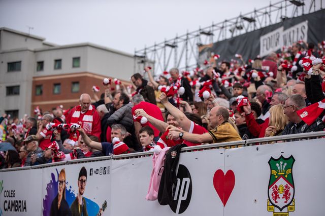 Wrexham fans during the Sky Bet League 1 match Wrexham vs Stockport County at SToK Cae Ras, Wrexham, United Kingdom, 22nd March 2025

(Photo by Nik Mesney/News Images)