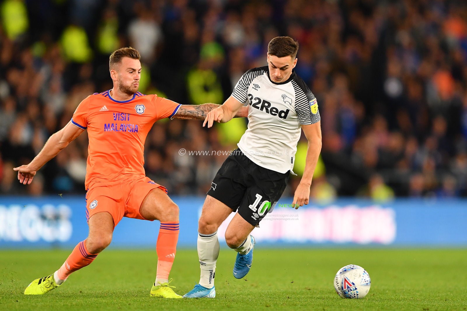 13th September 2019, Pride Park, Derby, England; Sky Bet Championship Football, Derby County vs Cardiff City ; Tom Lawrence (10) of Derby County battles with Joe Ralls (8) of Cardiff City 

Credit: Jon Hobley/News Images 

English Football League images are subject to DataCo Licence