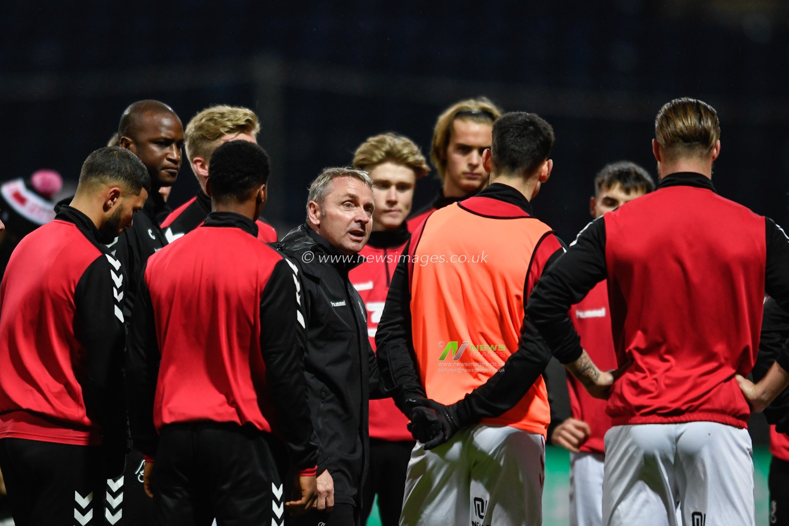 Paul Simpson Bristol City assistant head coach talks to the players before the game