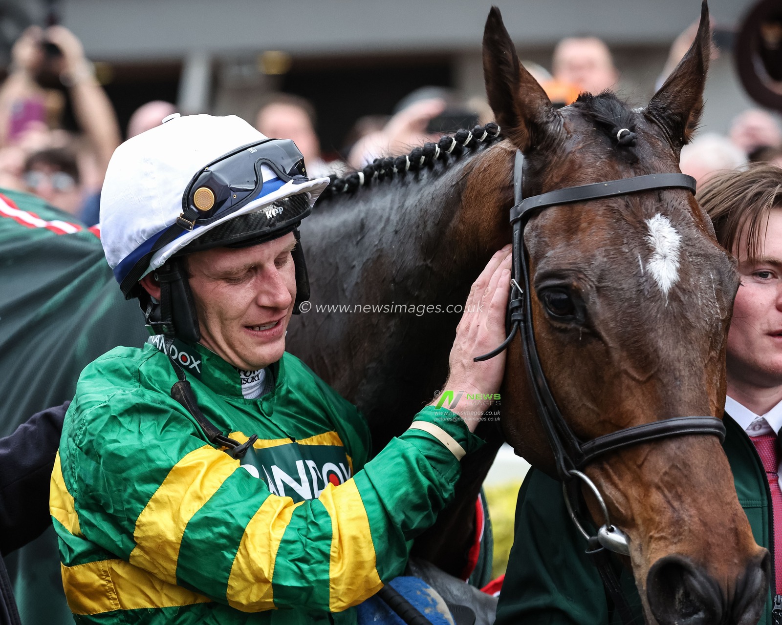 Paul Townend pats I Am Maximus on the head after winning the 16:00 Randox Grand National Handicap Chase on I Am Maximus during the Randox Grand National Day 2024 at Aintree Racecourse, Liverpool, United Kingdom, 13th April 2024

(Photo by Mark Cosgrove/News Images)