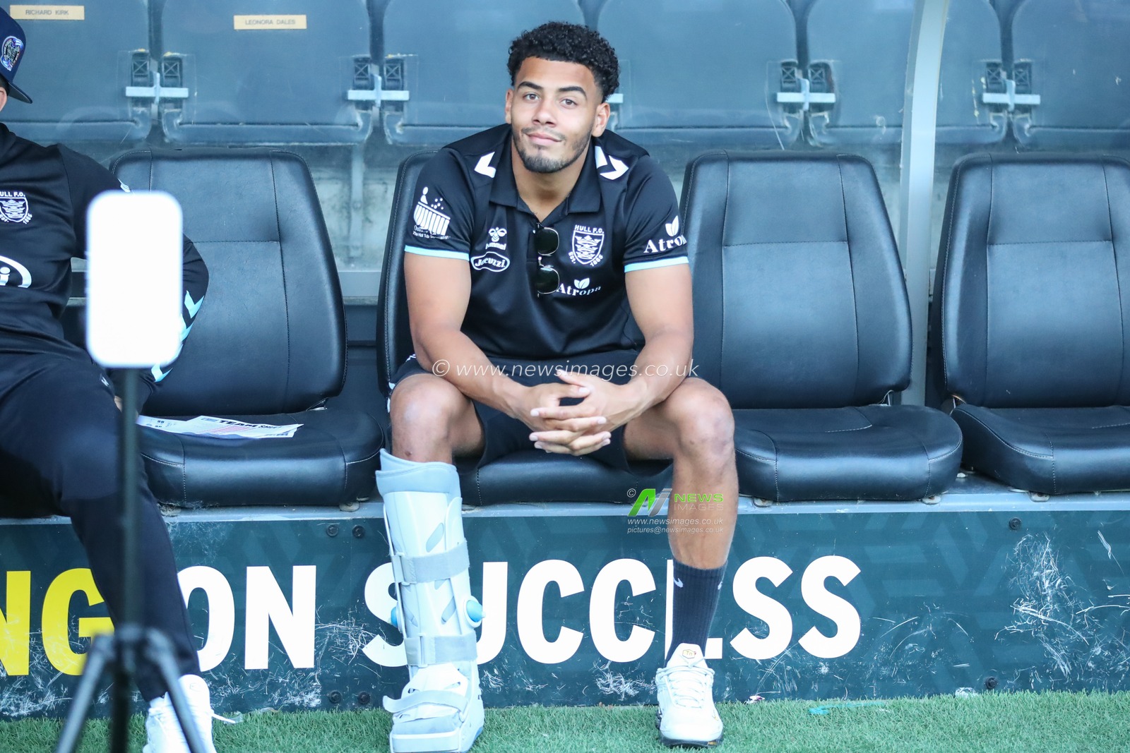 Darnell McIntosh #5 of Hull FC sitting this one out wearing a boot after an injury against St Helens