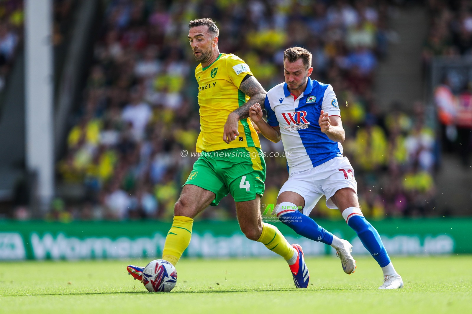 Shane Duffy of Norwich City is put under pressure by Ryan Hedges of Blackburn Rovers during the Sky Bet Championship match Norwich City vs Blackburn Rovers at Carrow Road, Norwich, United Kingdom, 17th August 2024

(Photo by Izzy Poles/News Images)