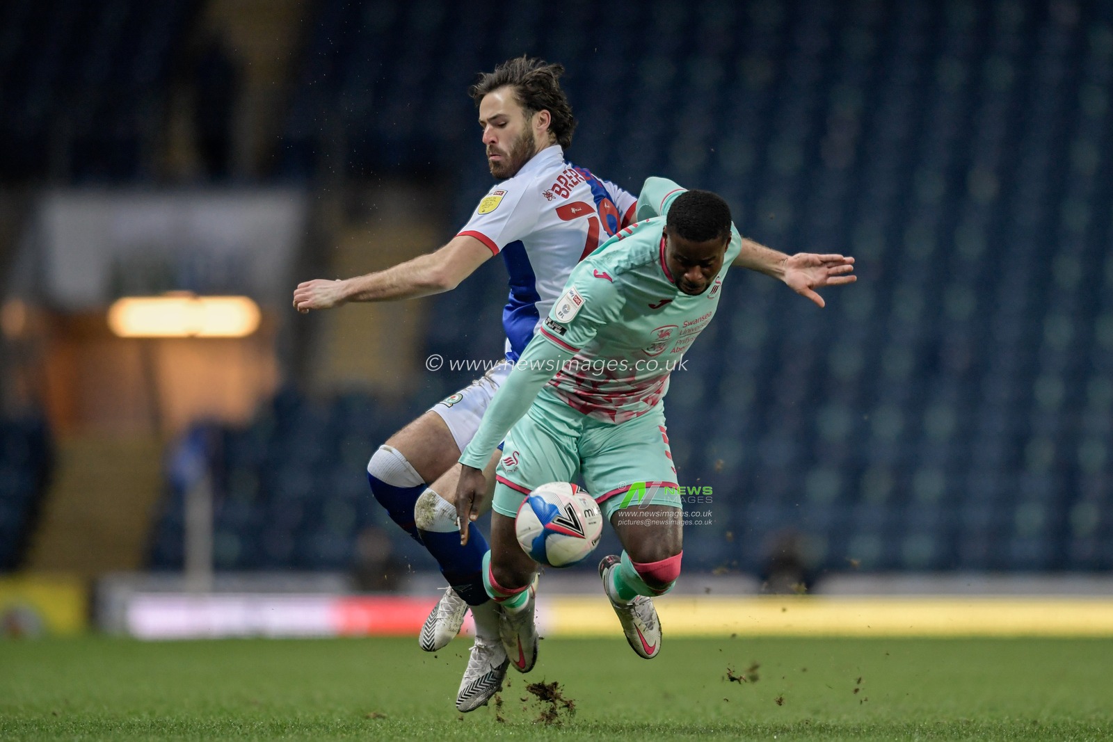 Ben Brereton #20 of Blackburn Rovers challenges Marc Guehi #5 of Swansea City for the ball