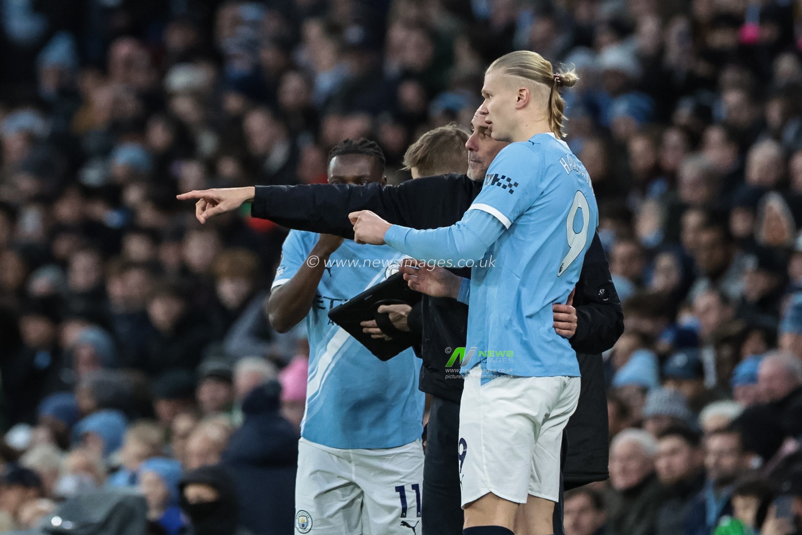 Pep Guardiola manager of Manchester City gives instruction to Erling Haaland of Manchester City as he prepares to come on in the second half during the Premier League match Manchester City vs Wolverhampton Wanderers at Etihad, Manchester, United Kingdom on 24 January 2026

(Photo by Mark Cosgrove/News Images)