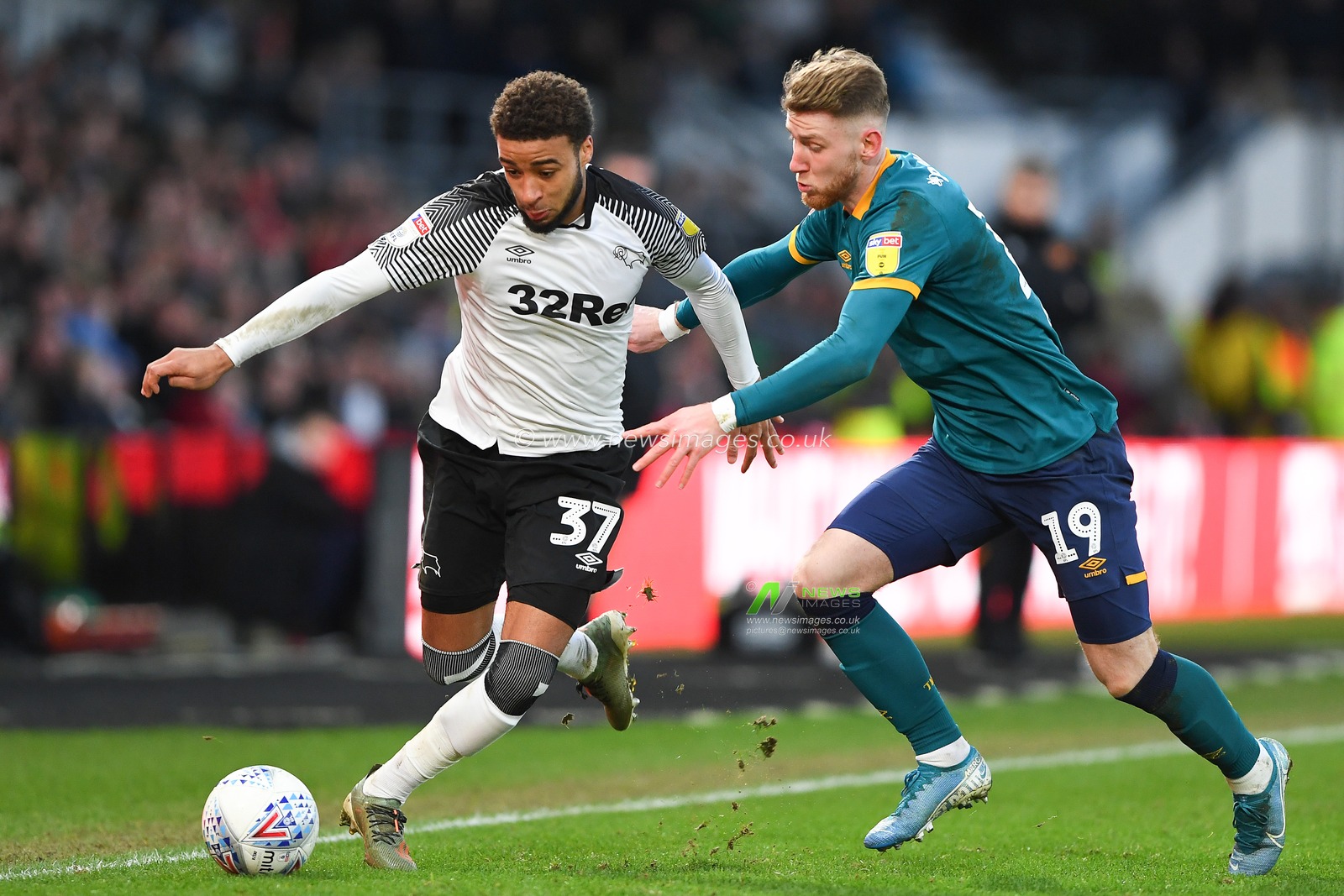 18th January 2020, Pride Park Stadium, Derby, England; Sky Bet Championship, Derby County v Hull City : Jayden Bogle (37) of Derby County holds off Josh Bowler (19) of Hull City 

Credit: Jon Hobley/News Images