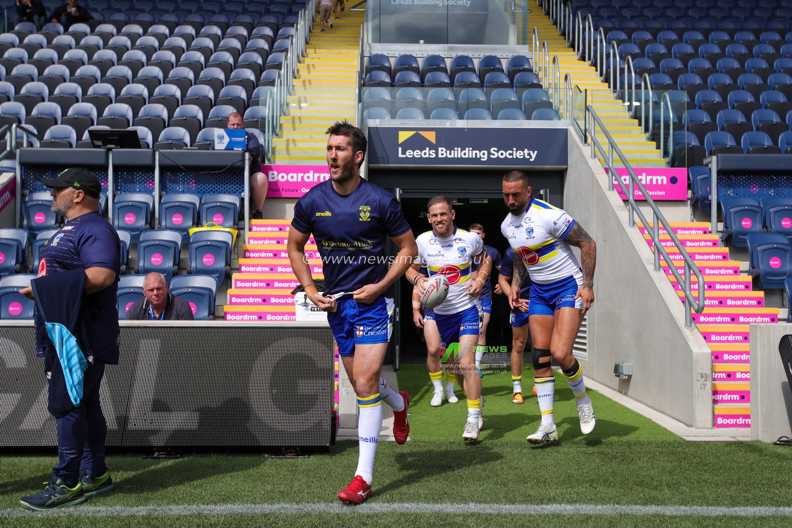 Stefan Ratchford #4 of Warrington Wolves leads his team out for the warm up ahead of the Betfred Super League Round 22 match Leeds Rhinos vs Warrington Wolves at Headingley Stadium, Leeds, United Kingdom, 20th August 2023

(Photo by James Heaton/News Images)