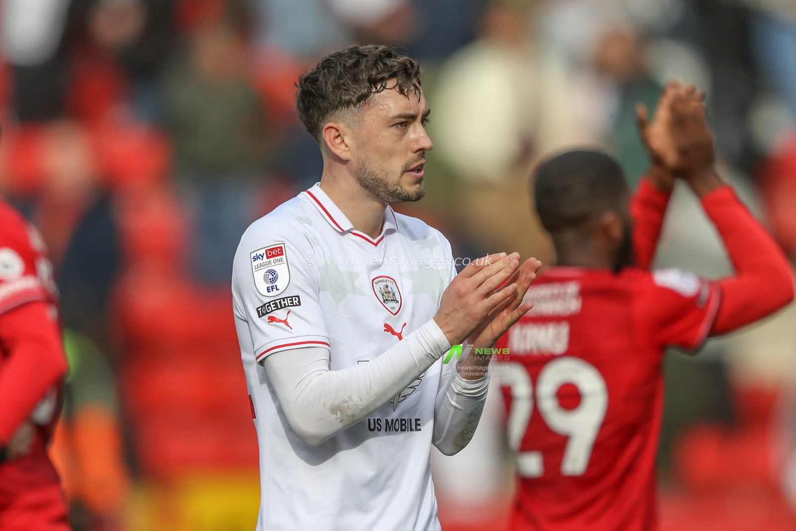 Corey O'Keeffe of Barnsley applauds the travelling fans after the game during the Sky Bet League 1 match Charlton Athletic vs Barnsley at The Valley, London, United Kingdom, 6th April 2024

(Photo by Alfie Cosgrove/News Images)