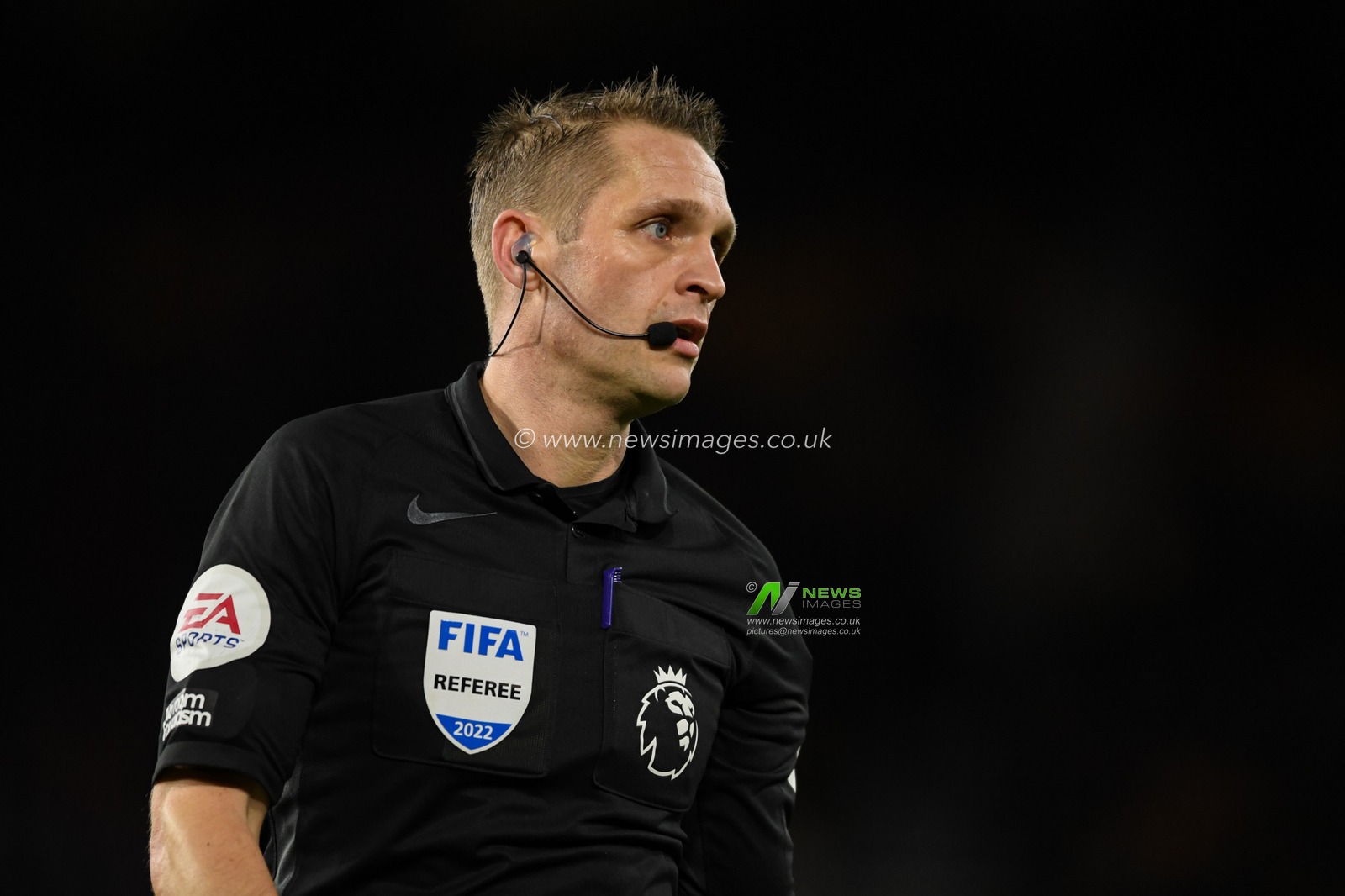 Referee Craig Pawson in action during the game