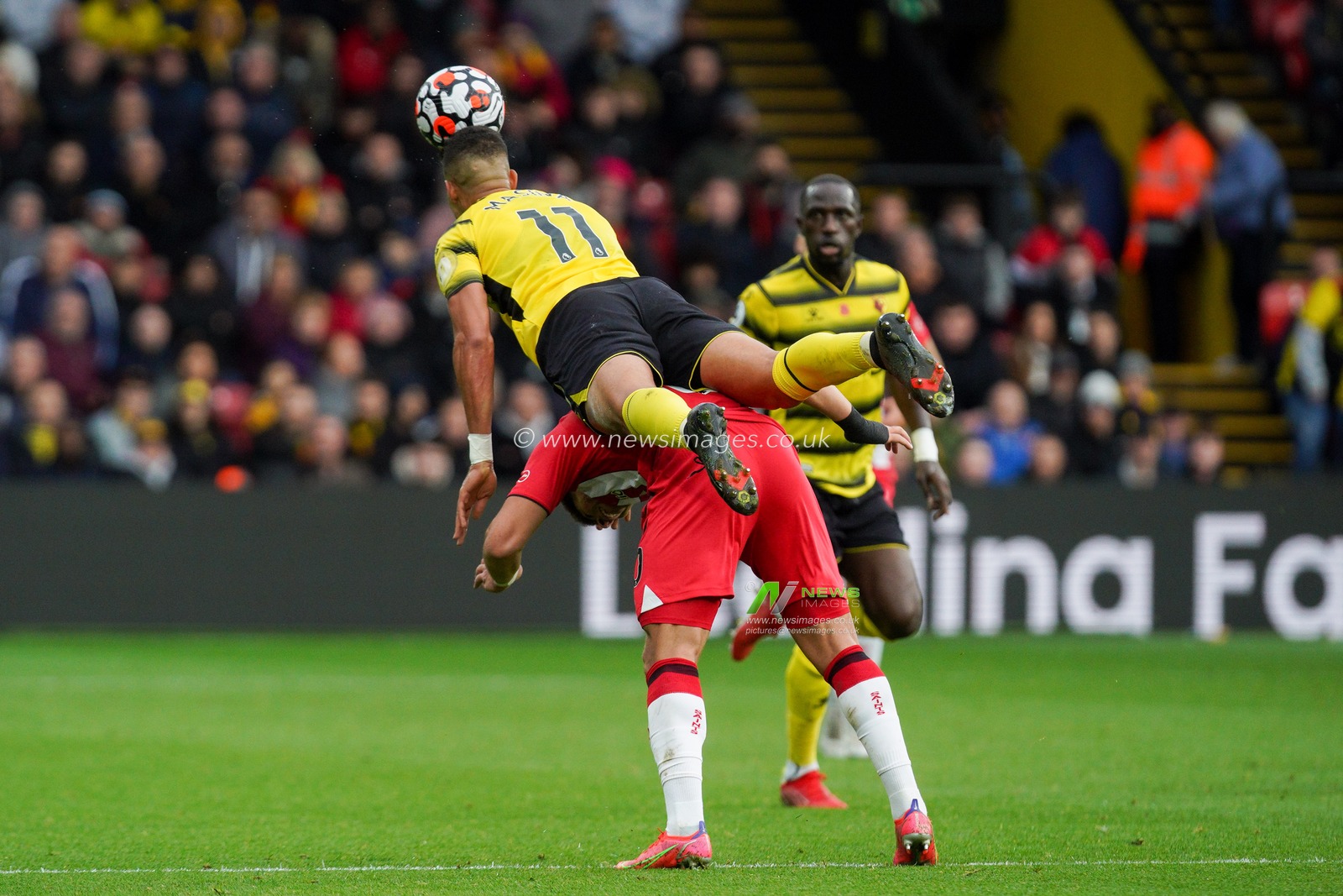 Adam Masina #11 of Watford battles with Che Adams #10 of Southampton