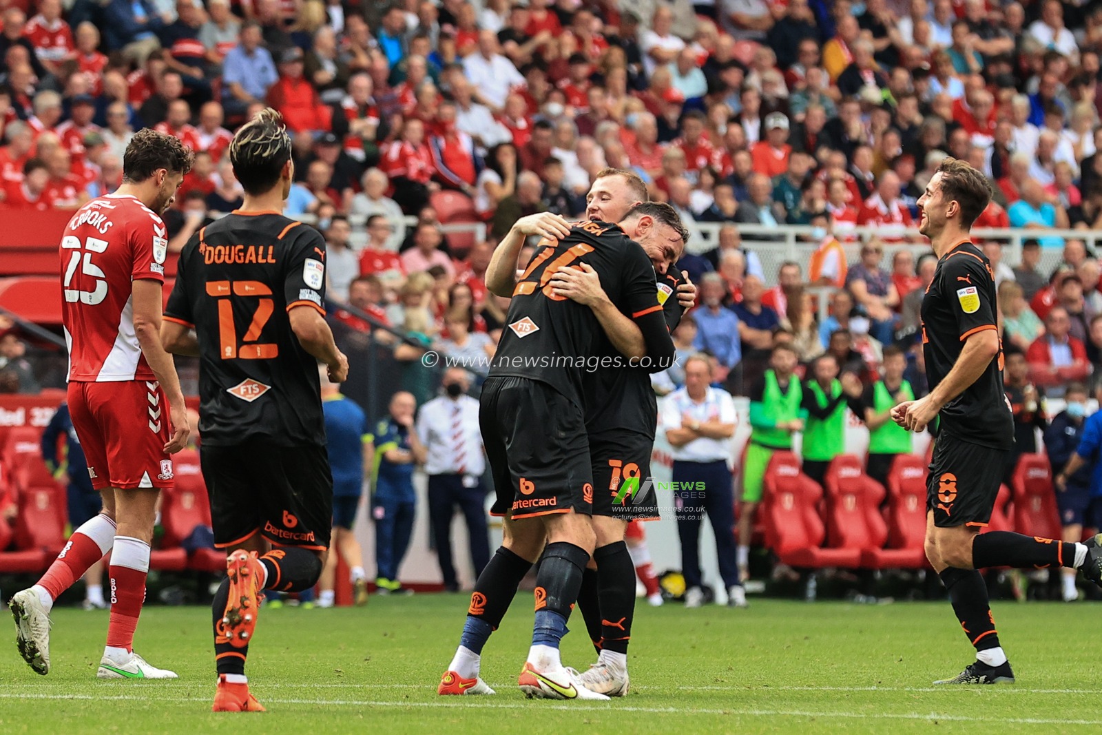 Shayne Lavery #19 of Blackpool celebrate Grant Hall #4 of Middlesbroughâ€™s own goal with Richard Keogh #26 of Blackpool