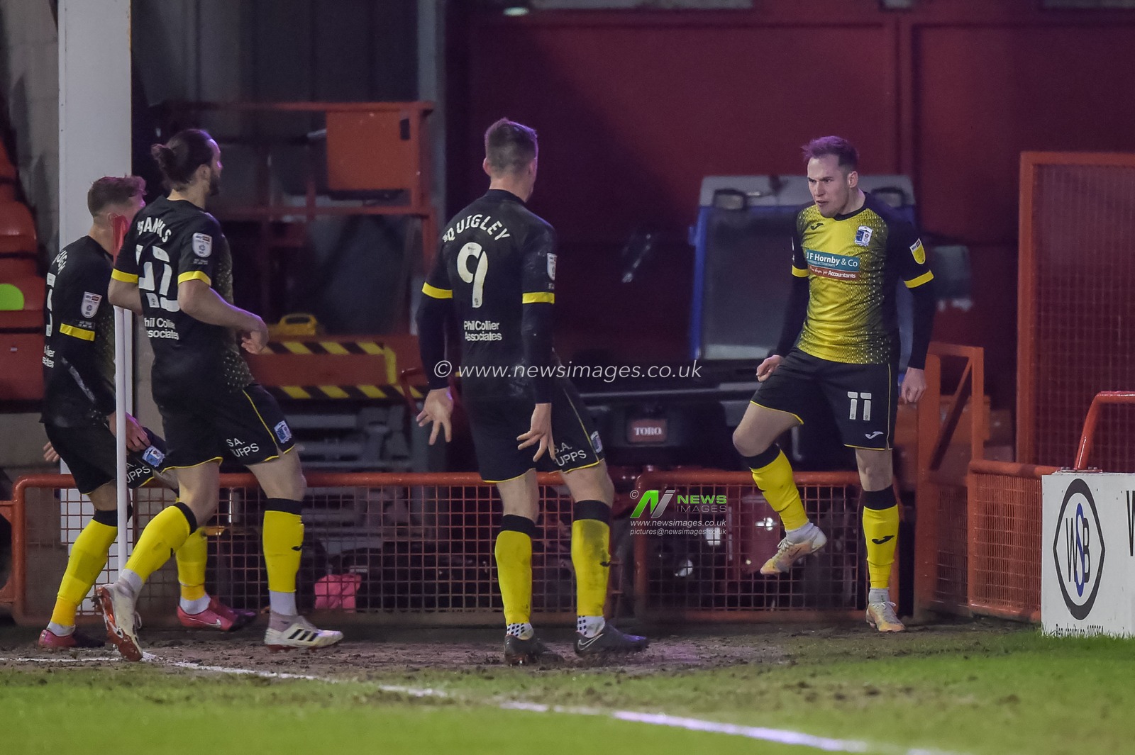 Josh Kay #11 of Barrow celebrates his goal to make it 0-1