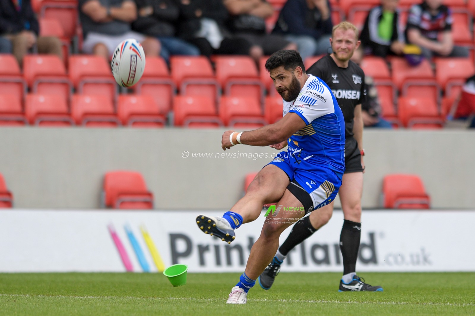 Rhyse Martin (12) of Leeds Rhinos successfully kicks a conversion to make it 8-16
