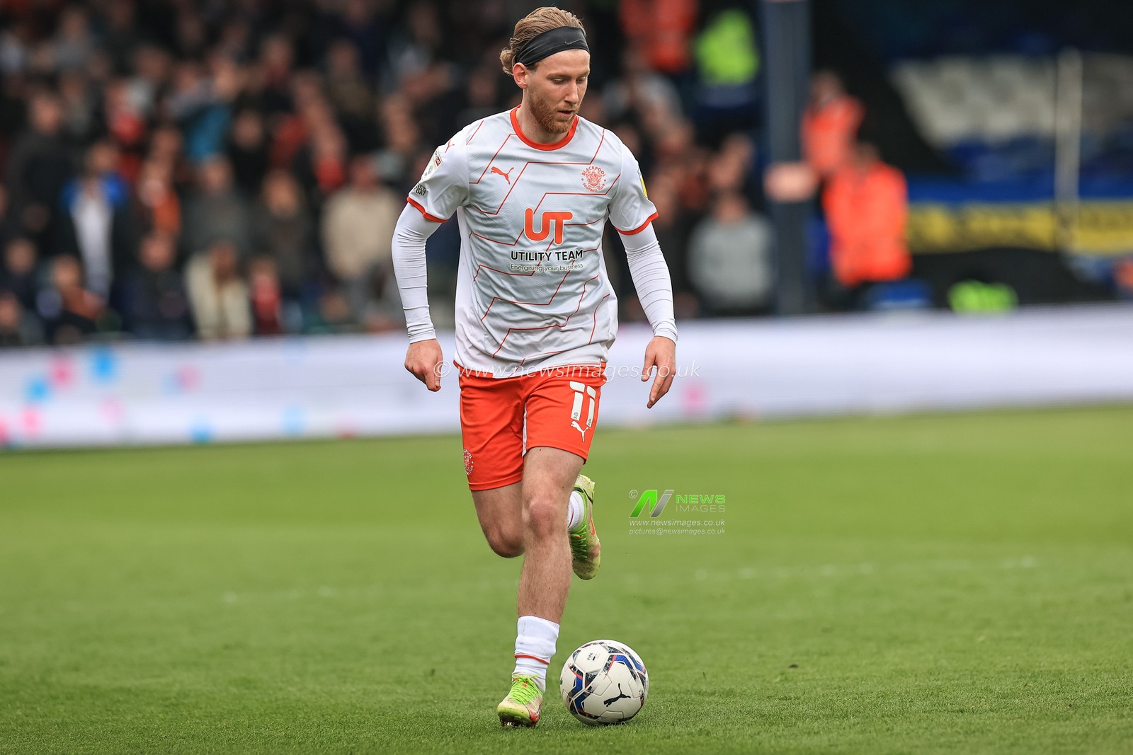 Josh Bowler #11 of Blackpool breaks with the ball
