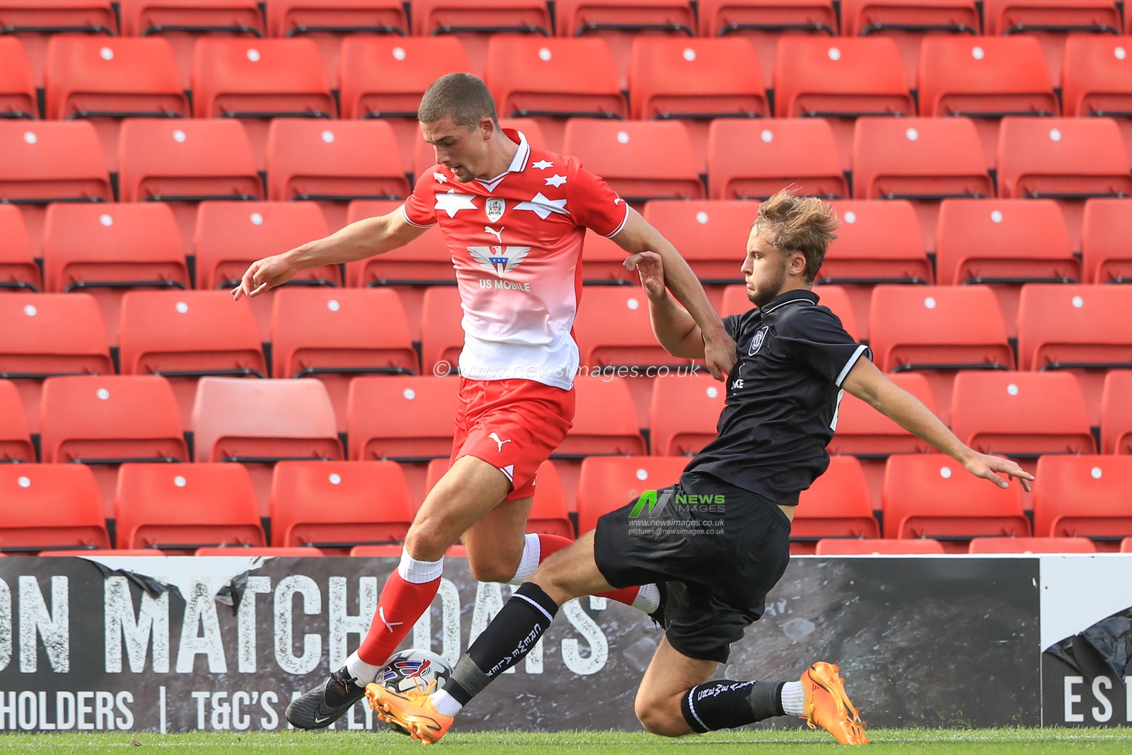 Max Watters #36 of Barnsley gets tackled during the Pre-season friendly match Barnsley vs Crewe Alexandra at Oakwell, Barnsley, United Kingdom, 29th July 2023

(Photo by Alfie Cosgrove/News Images)