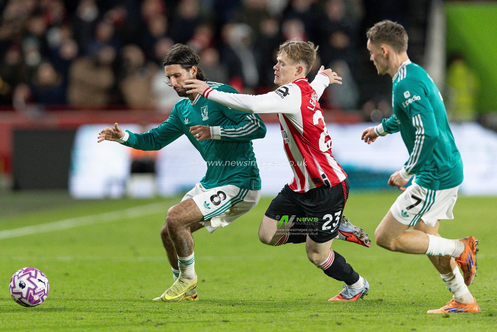 Dominik Szoboszlai of Liverpool tackles Keane Lewis-Potter of Brentford during the Premier League match Brentford vs Liverpool at The Gtech Community Stadium, London, United Kingdom, 25th October 2025

(Photo by Ian Stephen/News Images)