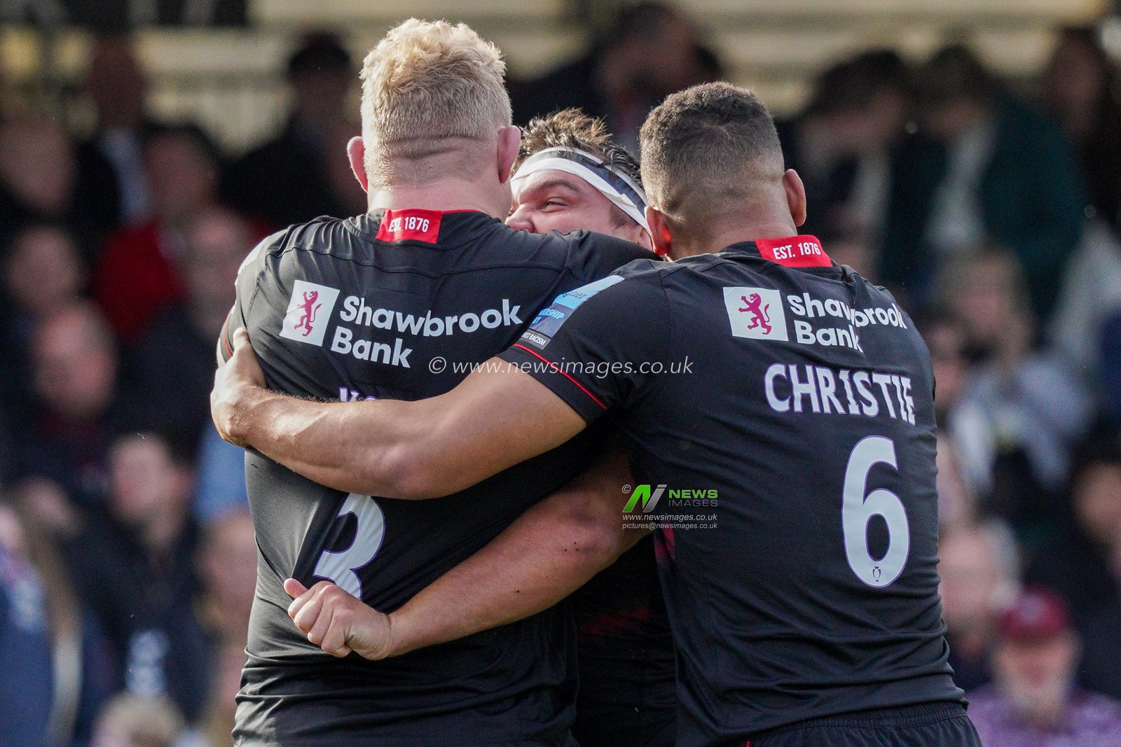 Jamie George #2 of Saracens celebrates scoring a try with  Vincent Koch #3 of Saracens and  Andy Christie #6 of Saracens