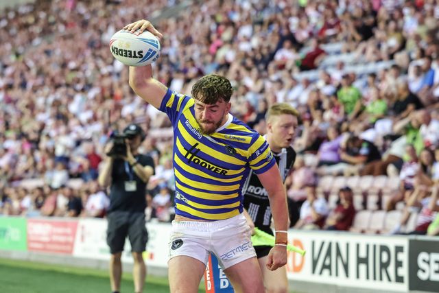 Matty Ashton of Warrington Wolves celebrates his try during the Betfred Super League round 18 match Wigan Warriors vs Warrington Wolves at The Brick Community Stadium, Wigan, United Kingdom on 10 July 2026

(Photo by Mark Cosgrove/News Images)