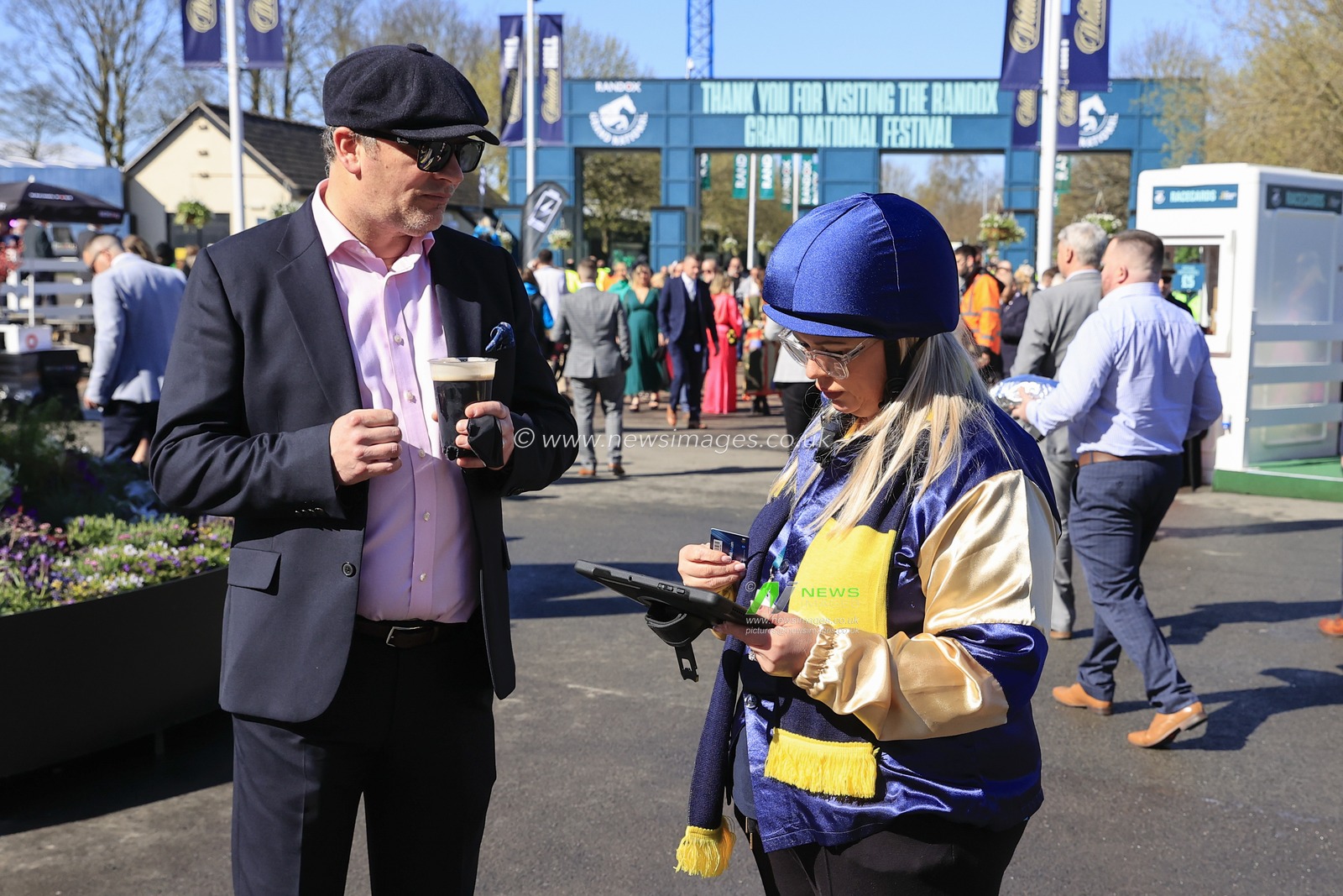 William Hill representative signing up punters to on-line accounts ahead of The Randox Grand National festival 2023 Grand National Day at Aintree Racecourse, Liverpool, United Kingdom, 15th April 2023

(Photo by Conor Molloy/News Images)
