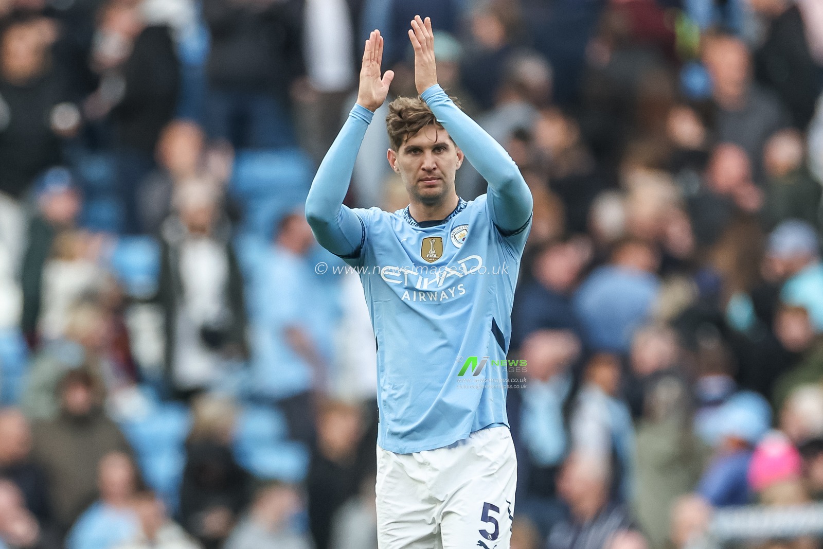 John Stones of Manchester City applauds the fans after City after City win 3-1 during the Premier League match Manchester City vs Fulham at Etihad Stadium, Manchester, United Kingdom, 5th October 2024

(Photo by Mark Cosgrove/News Images)
