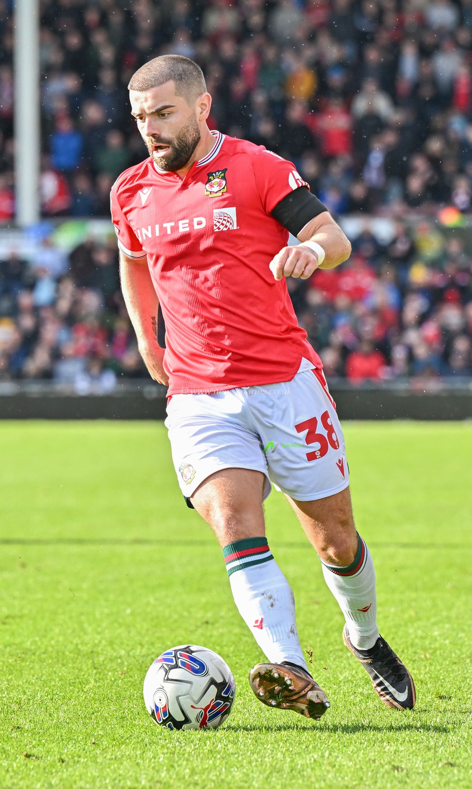 Elliot Lee 38# of Wrexham Association Football Club on the ball, during the Sky Bet League 2 match Wrexham vs Salford City at SToK Cae Ras, Wrexham, United Kingdom, 14th October 2023

(Photo by Cody Froggatt/News Images)