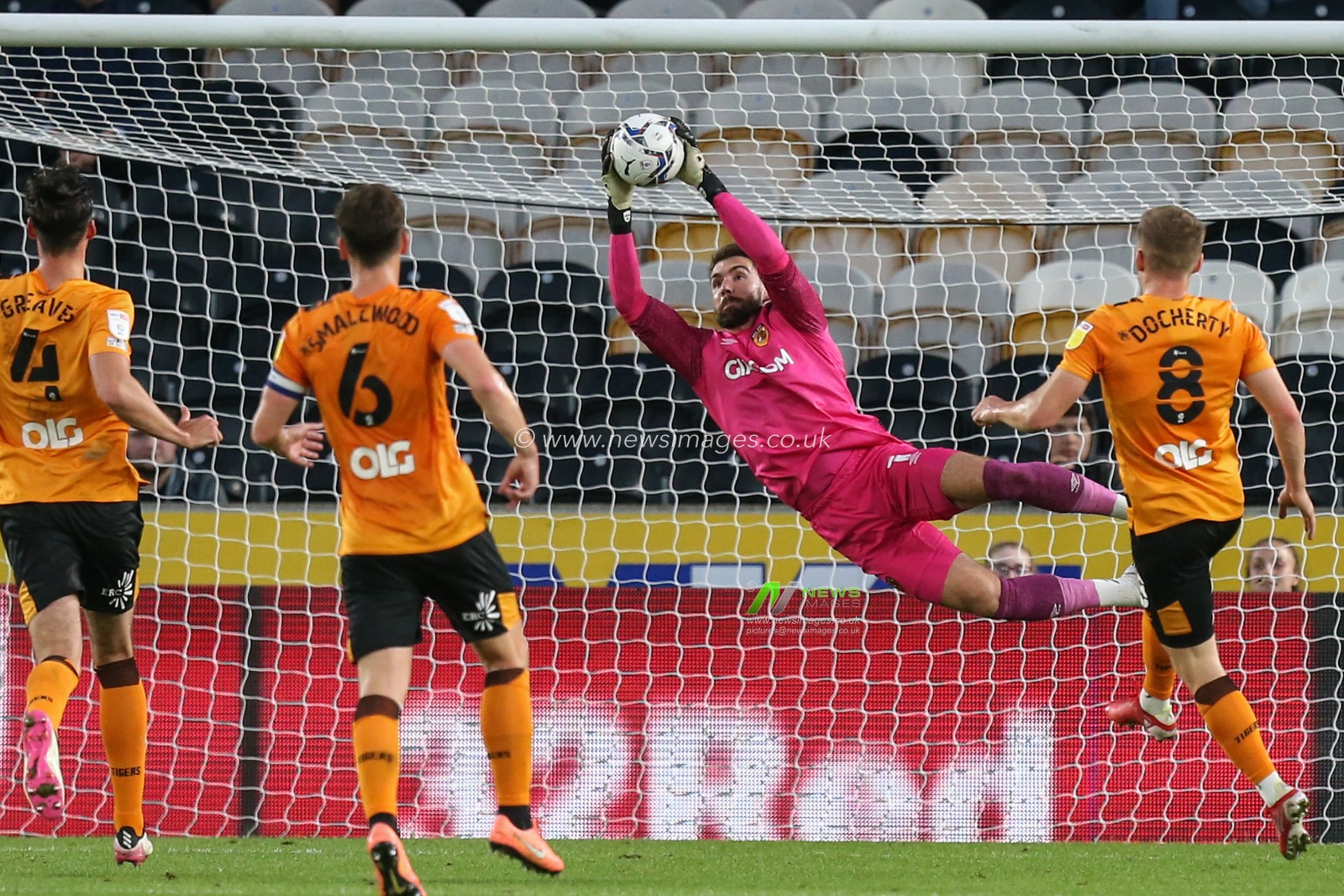 Matt Ingram #1 of Hull City makes a good save in the first half