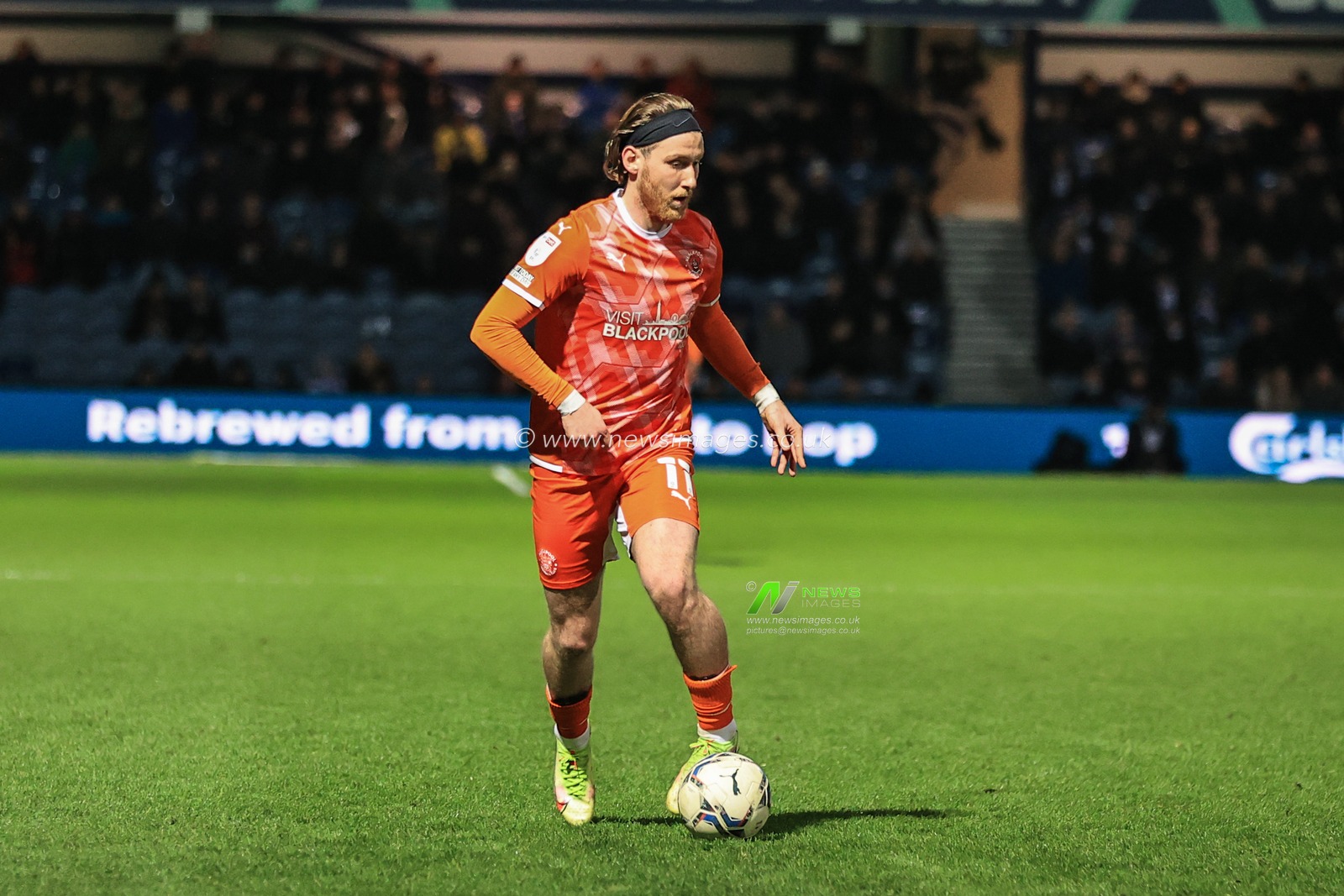 Josh Bowler #11 of Blackpool breaks