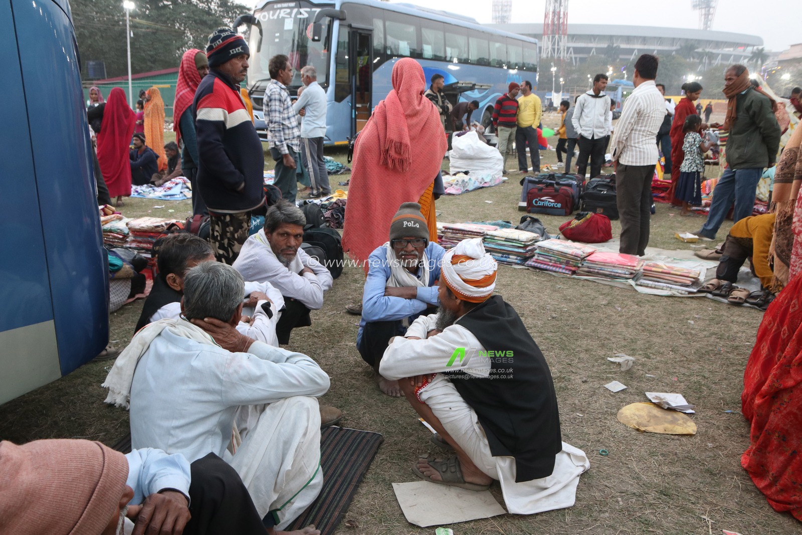 Hindu pilgrims take a rest before visiting  Gangasagar fair at a transit camp in Kolkata, India on January 5,2025 in Kolkata,India. Thousands of Hindu pilgrims are expected to take the annual holy dip at Gangasagar, where the Ganges River reaches the Bay of Bengal, on the auspicious Makar Sankranti festival day that falls on Jan,14.Pictures by Debajyoti Chakraborty.(Photo: Debajyoti Chakraborty/News Images)