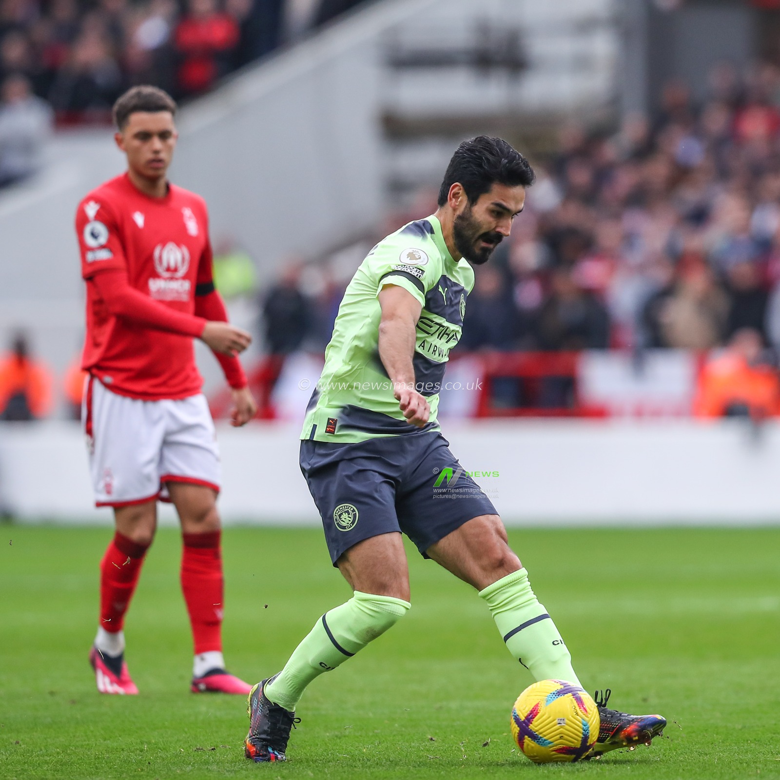 Ä°lkay GÃ¼ndoÄŸan #8 of Manchester City passes during the Premier League match Nottingham Forest vs Manchester City at City Ground, Nottingham, United Kingdom, 18th February 2023

(Photo by Gareth Evans/News Images)