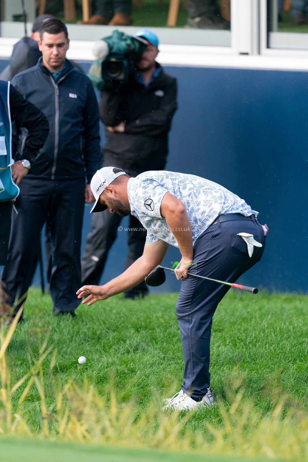 Jon Rahm (ESP) 18th green takes a drop during the BMW PGA Championship 2022 day 1 at Wentworth Club, Virginia Water, United Kingdom, 8th September 2022

(Photo by Richard Washbrooke/News Images)