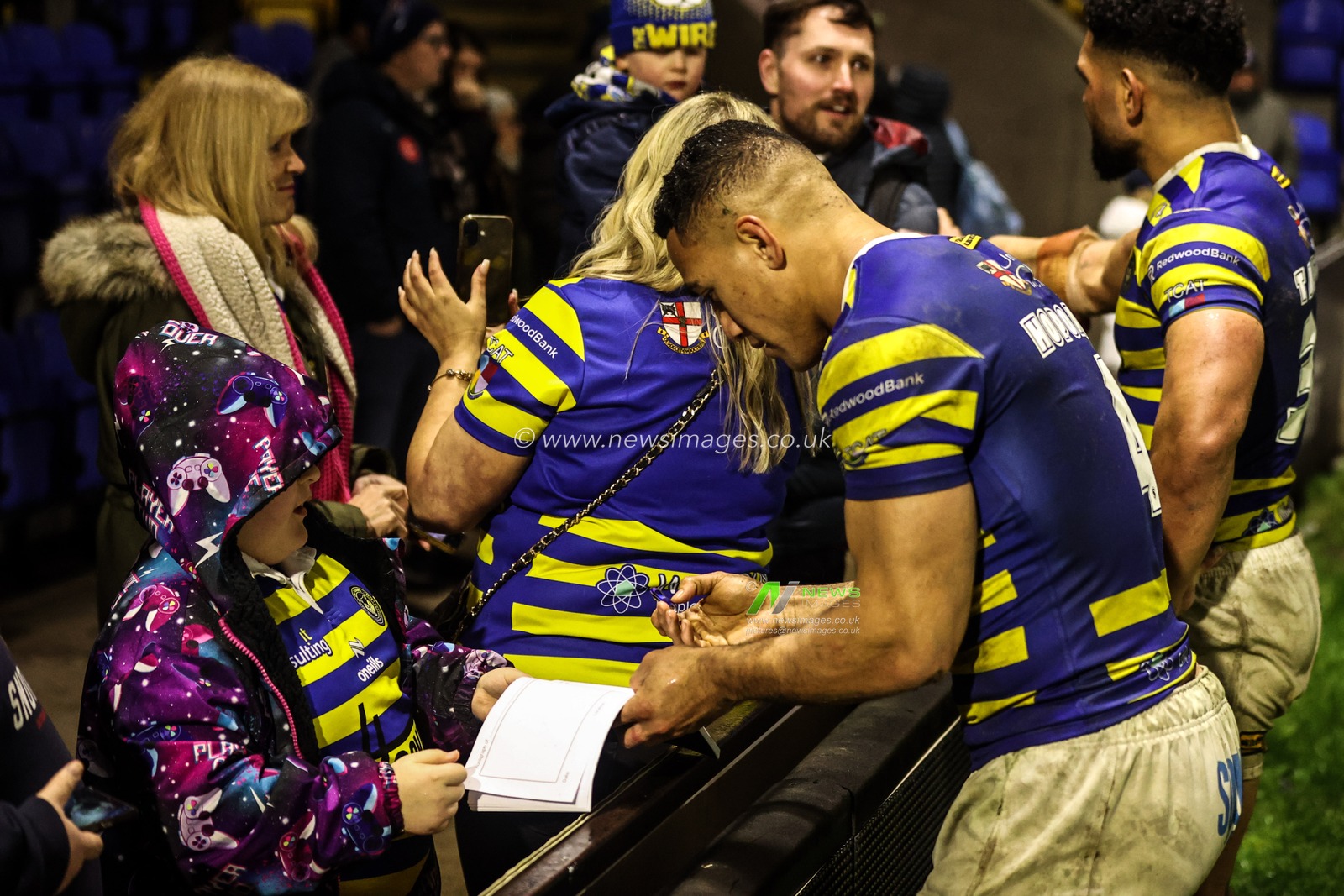 Albert Hopoate of Warrington Wolves signs a fans book during the Betfred Challenge Cup match Warrington Wolves vs Sheffield Eagles at The Halliwell Jones Stadium, Warrington, United Kingdom on 06 February 2026

(Photo by Alfie Cosgrove/News Images)