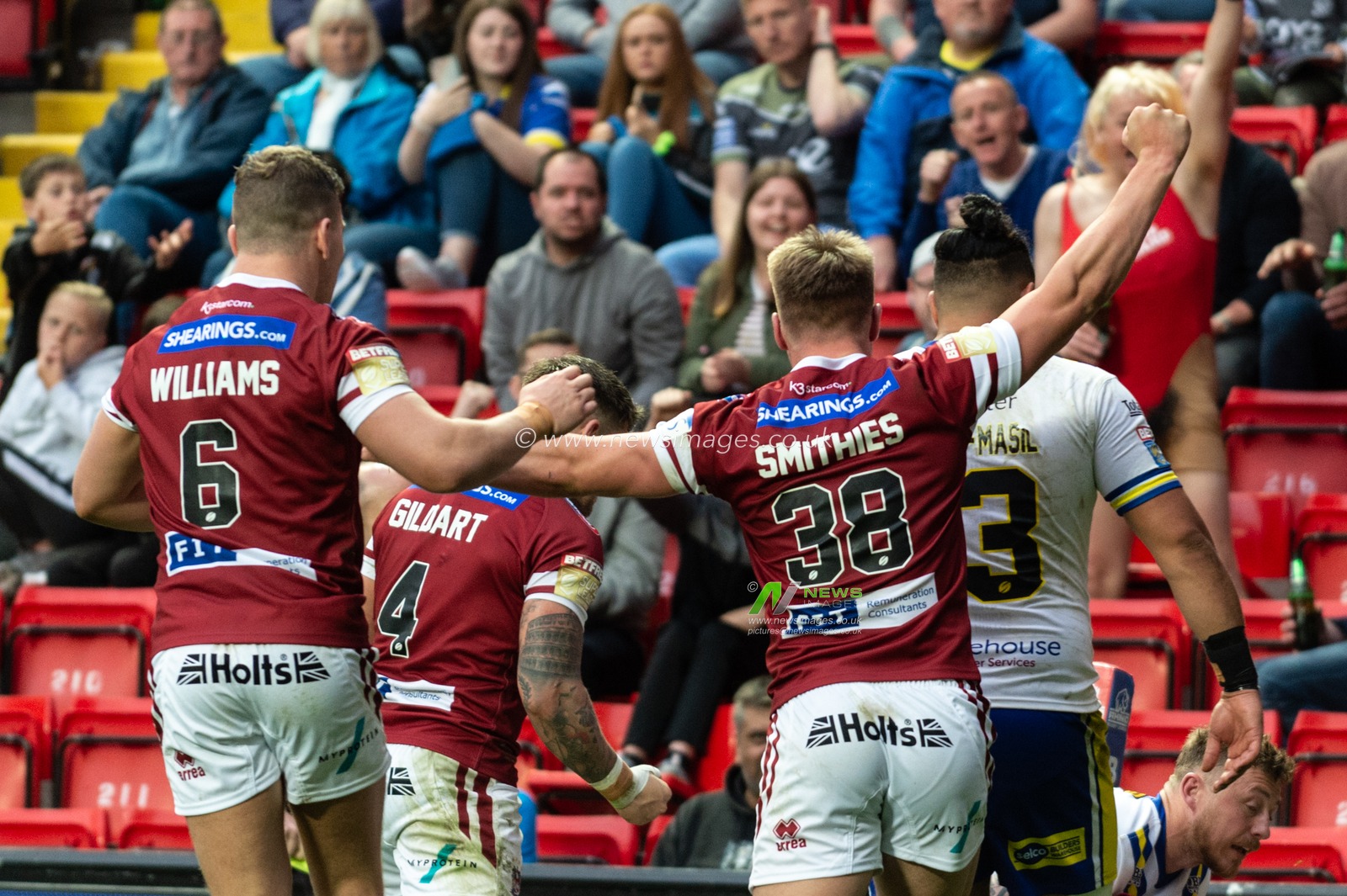 25th May 2019 , Anfield Stadium, Liverpool, England; Dacia Magic Weekend, Betfred Super League Round 16, Wigan Warriors vs Warrington Wolves ; Joe Burgess (5) of Wigan Warriors celebrates his try with team mates

Credit: Richard Long/News Images