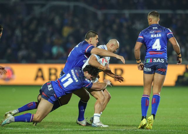 Paul Ulberg of Toulouse Olympique is tackled by Seth Nikotemo of Wakefield Trinity during the Betfred Super League Round 1 match Wakefield Trinity vs Toulouse Olympique at DIY Kitchens Stadium, Wakefield, United Kingdom on 14 February 2026

(Photo by Richard Bierton/News Images)