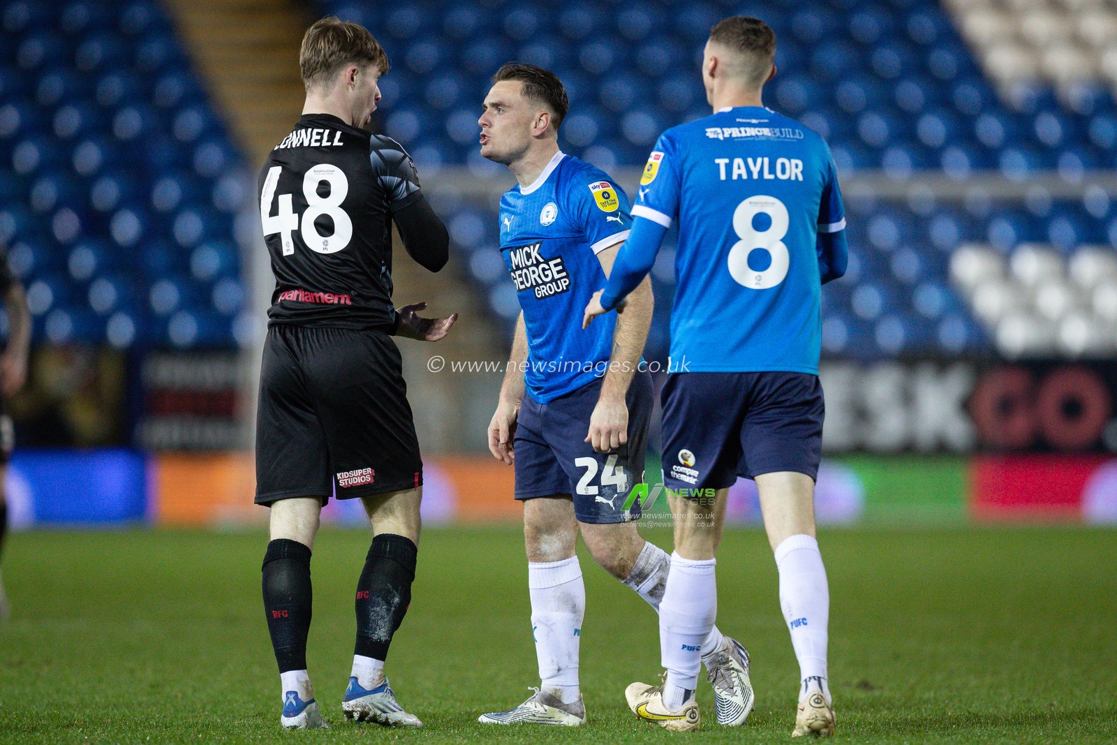 Luca Connell #48 of Barnsley gets into a disagreement with Ben Thompson #24 of Peterborough United during the Sky Bet League 1 match Peterborough vs Barnsley at Weston Homes Stadium, Peterborough, United Kingdom, 2nd December 2022

(Photo by James Heaton/News Images)