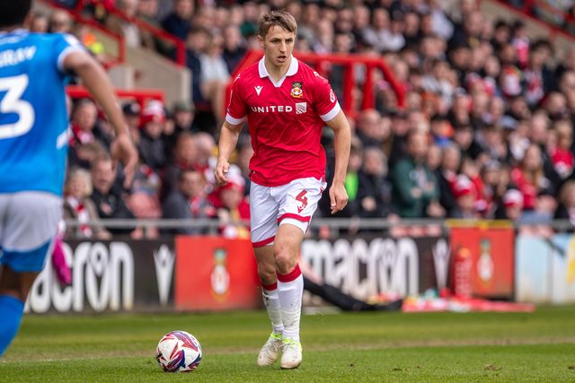 Wrexham's Max Cleworth carries the ball during the Sky Bet League 1 match Wrexham vs Stockport County at SToK Cae Ras, Wrexham, United Kingdom, 22nd March 2025

(Photo by Nik Mesney/News Images)