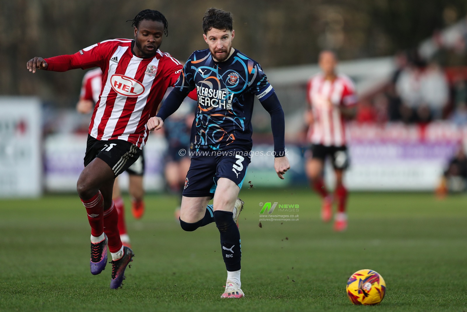 James Husband of Blackpool passes the ball during the Sky Bet League 1 match Exeter City vs Blackpool at St James' Park, Exeter, United Kingdom, 25th January 2025

(Photo by Gareth Evans/News Images)