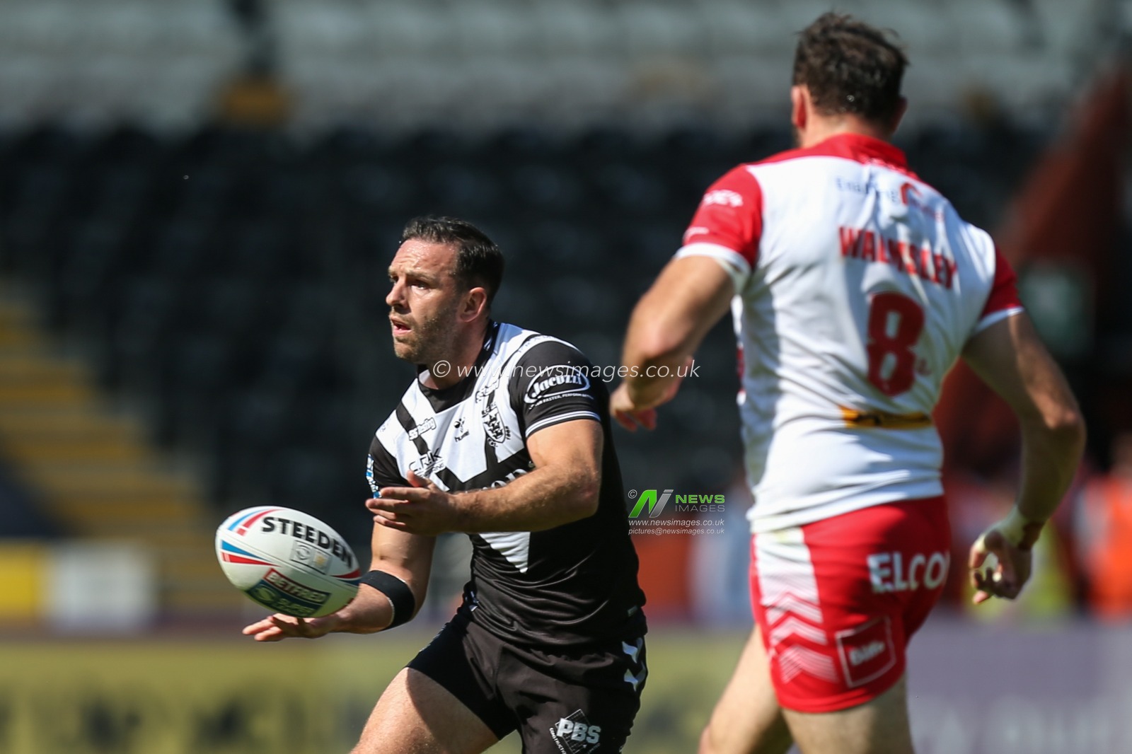Luke Gale #7 of Hull FC passes the ball