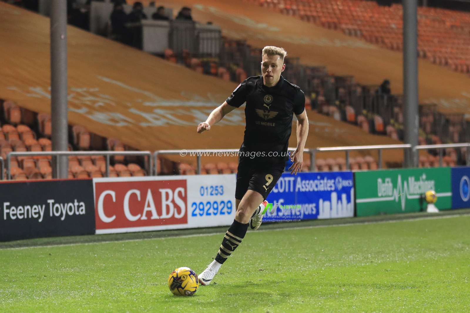Sam Cosgrove #9 of Barnsley breaks with the ball during the Bristol Street Motors Trophy match Blackpool vs Barnsley at Bloomfield Road, Blackpool, United Kingdom, 5th December 2023

(Photo by Alfie Cosgrove/News Images)