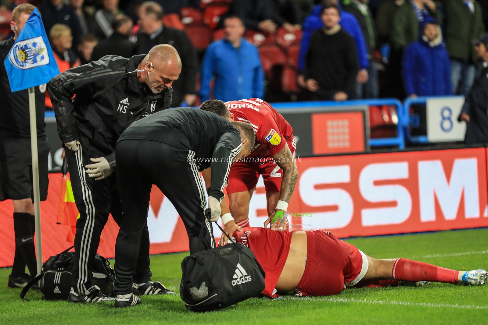 16th August 2019, John Smiths Stadium, Huddersfield England; Sky Bet Championship, Huddersfield Town vs Fulham ; Aleksandar Mitrovic (9) of Fulham rolls on the floor after a heavy tackle by Rajiv van La Parra (17) of Huddersfield Town and claims he hit him in the face 


Credit: Mark Cosgrove/News Images

English Football League images are subject to DataCo Licence