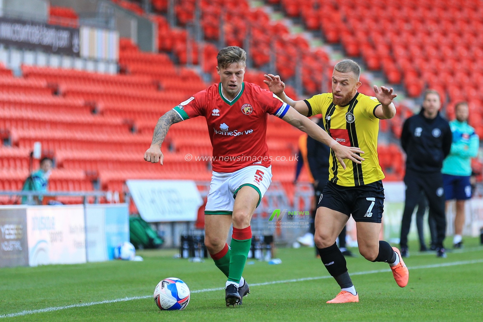James Clarke (5) of Walsall in action