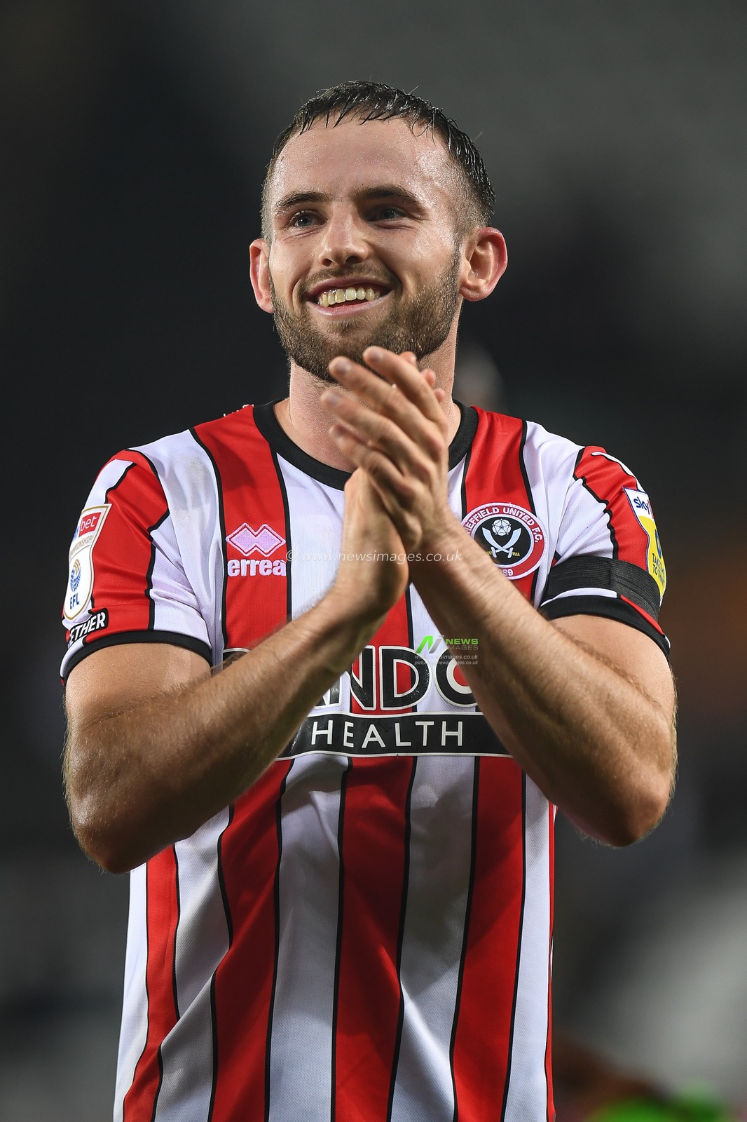Rhys Norrington-Davies #33 of Sheffield United Applauds the travelling supportersduring the Sky Bet Championship match Swansea City vs Sheffield United at Swansea.com Stadium, Swansea, United Kingdom, 13th September 2022

(Photo by Mike Jones/News Images)