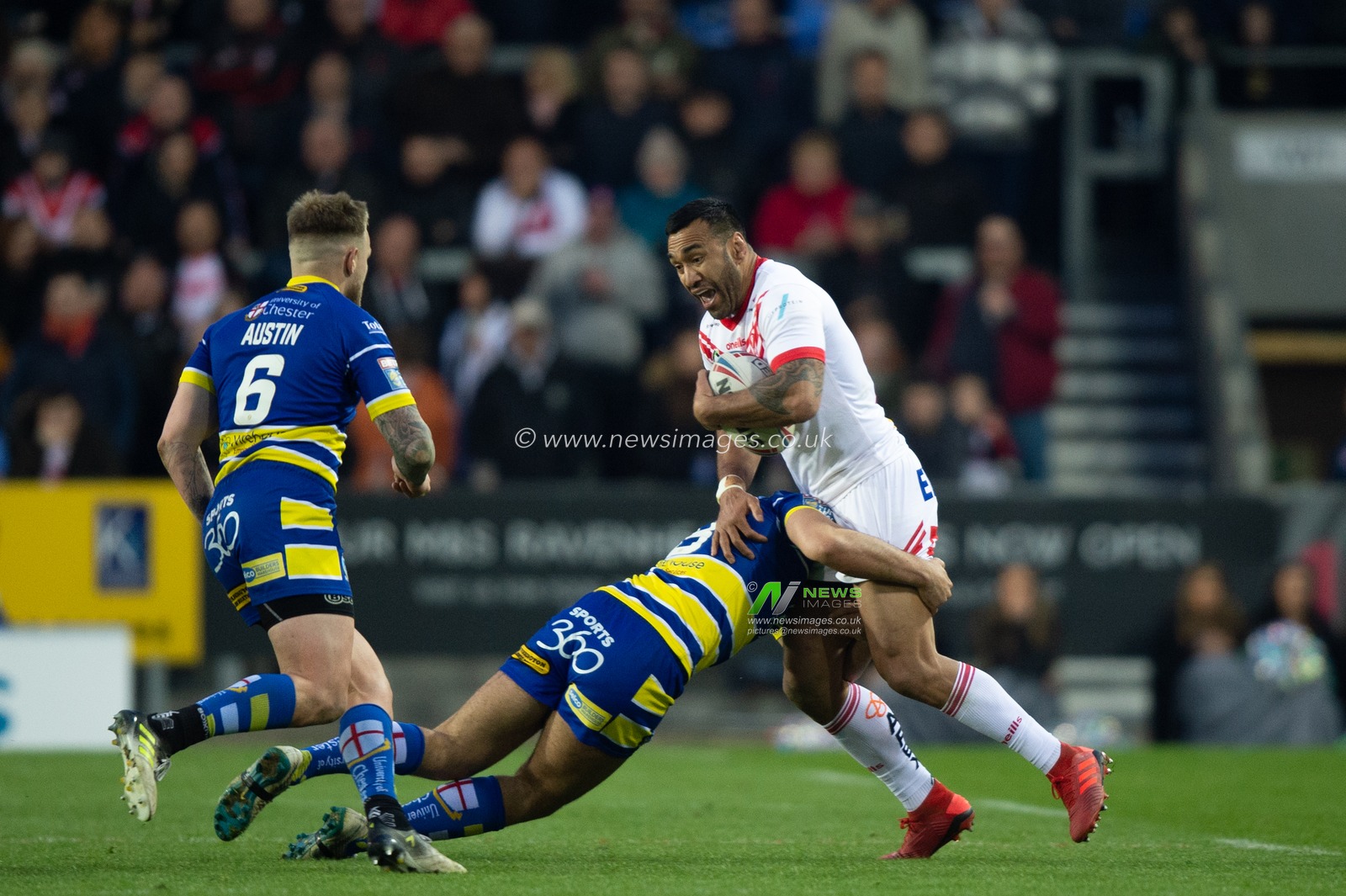 12th April 2019 , Totally Wicked Stadium, St Helens, England;  Betfred Super League, Round 10, St Helens vs Warrington Wolves,  Zeb Taia of St Helens is brought down 

Credit: Richard Long/News Images