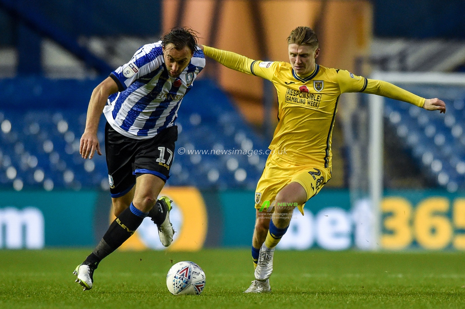 9th November 2019, Hillsborough, Sheffield, England; Sky Bet Championship, Sheffield Wednesday v Swansea City : Atdhe Nuhiu (17) of Sheffield Wednesday  and George Byers (28) of Swansea City challenge for a ball in the 2-2 encounter.

Credit: Dean Williams/News Images