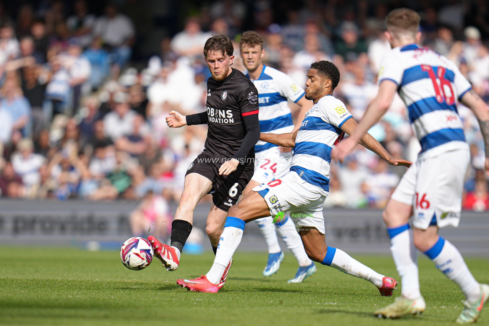 Jonathan Varane of Queens Park Rangers attempts to intercept Max Bird of Bristol City ball during the Sky Bet Championship match Queens Park Rangers vs Bristol City at Kiyan Prince Foundation Stadium, London, United Kingdom, 12th April 2025

(Photo by Harvey Murphy/News Images)