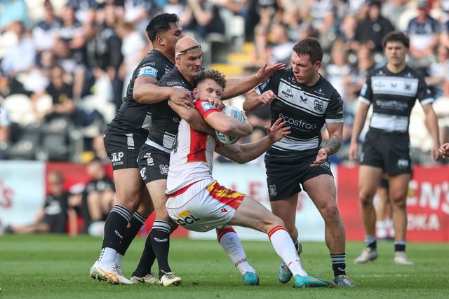 Matthieu Laguerre of Catalan Dragons is tackled by Danny Houghton of Hull FC during the Betfred Super League Round 27 match Hull FC vs Catalans Dragons at MKM Stadium, Hull, United Kingdom, 21st September 2024

(Photo by Alfie Cosgrove/News Images)