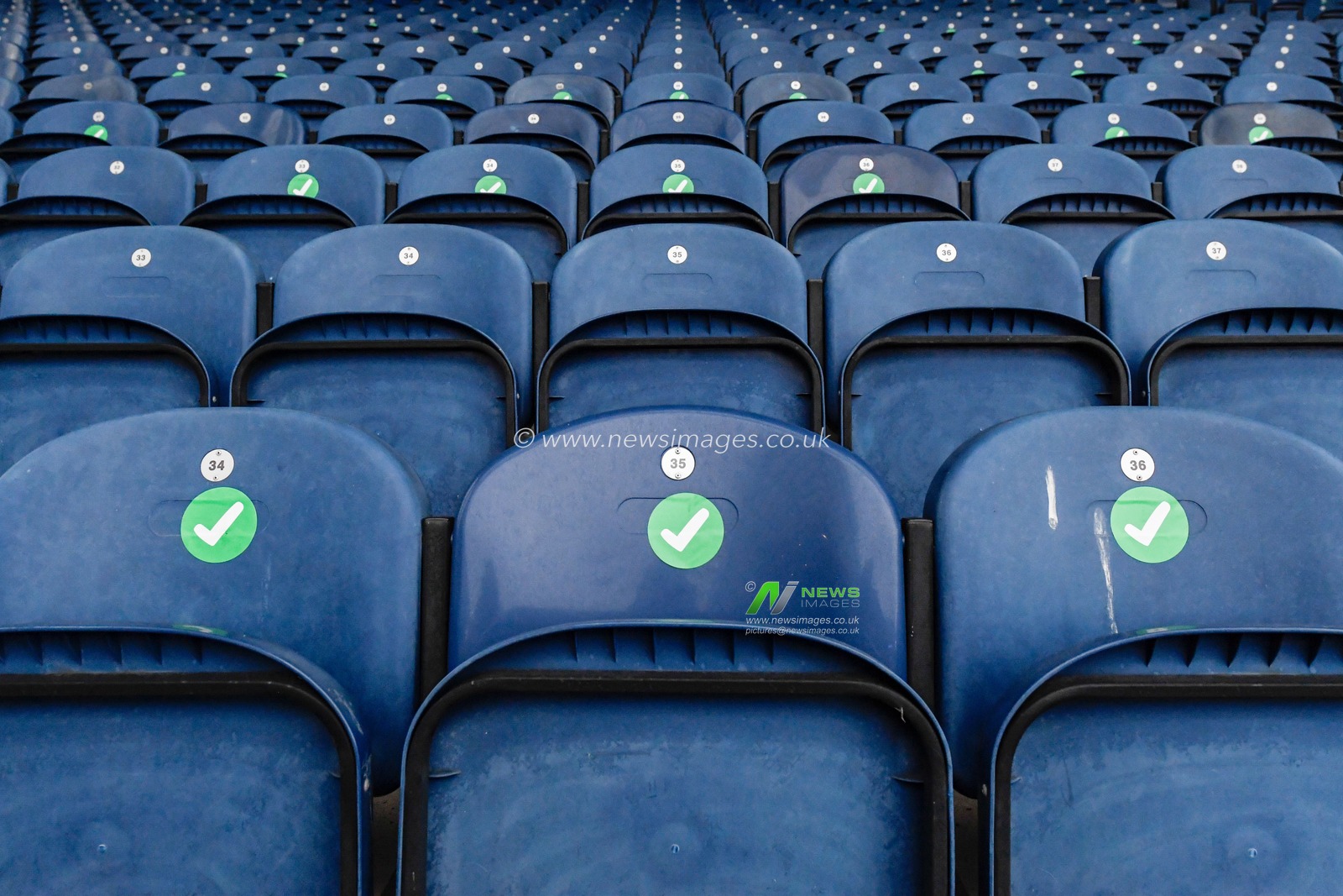 The empty seats at Ewood Park with green stickers in readiness for fans returning once Lancashire is out of Tier 3